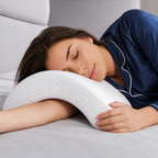 Couples Multi-Use Memory Foam Arc Support Pillow lifestyle shot on bed