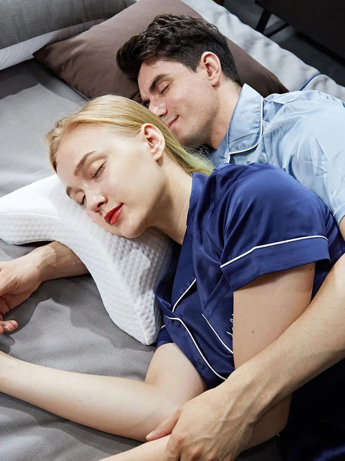 Couples Multi-Use Memory Foam Arc Support Pillow shown in use for cuddling